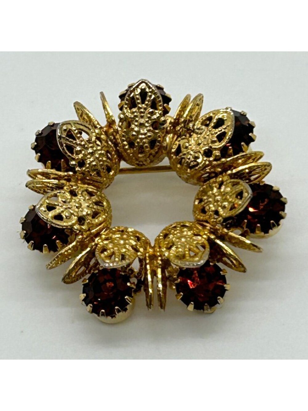 Vintage Gold Tone Brooch Wreath Burgundy Rhinestone 3D Filigree Pin Mid-Century